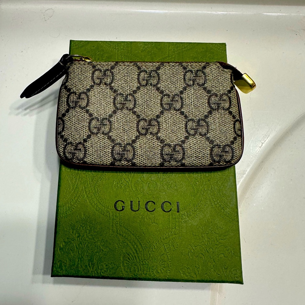 Gucci supreme key pouch